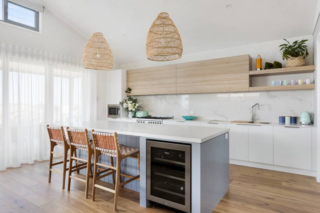 Hamptons kitchen with blue panelling and timber features