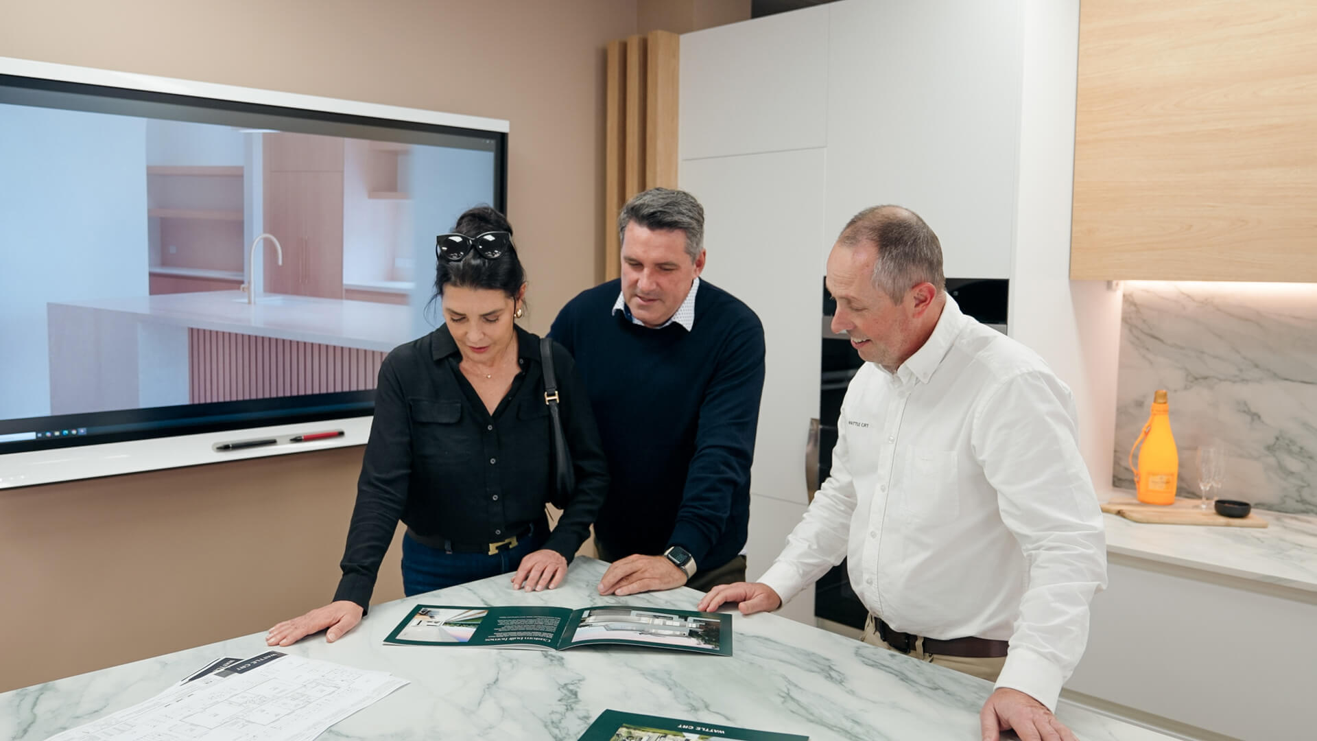 Consultant and customers exploring best home designs