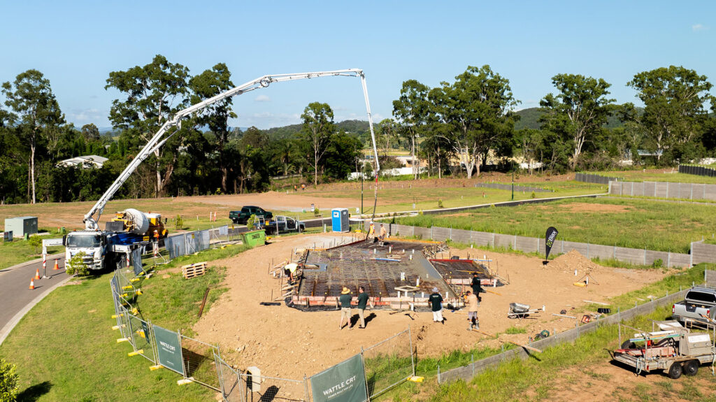 Concrete truck pouring an eco-friendly concrete slab